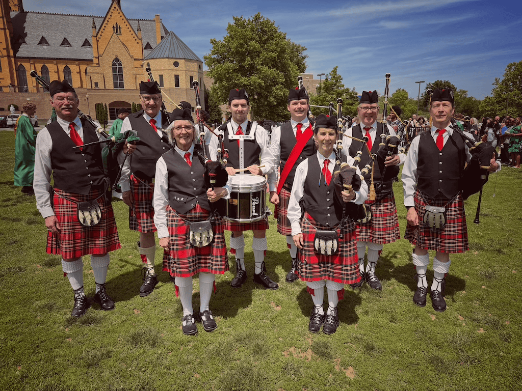 Kendall Giles playing bagpipes with the Virginia Highlands Pipes and Drums